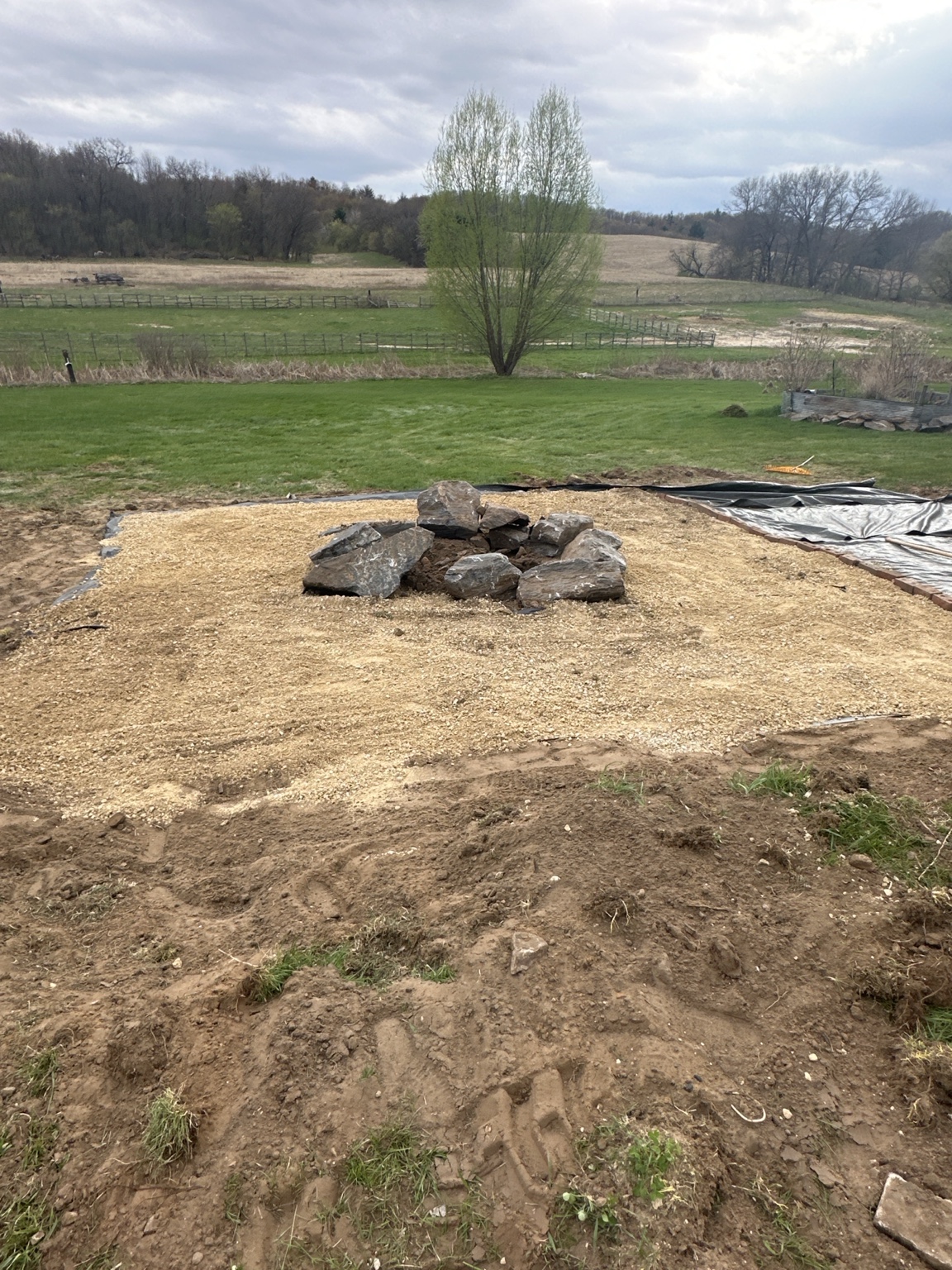 Gravel fire-pit gathering area at Rustic Memories