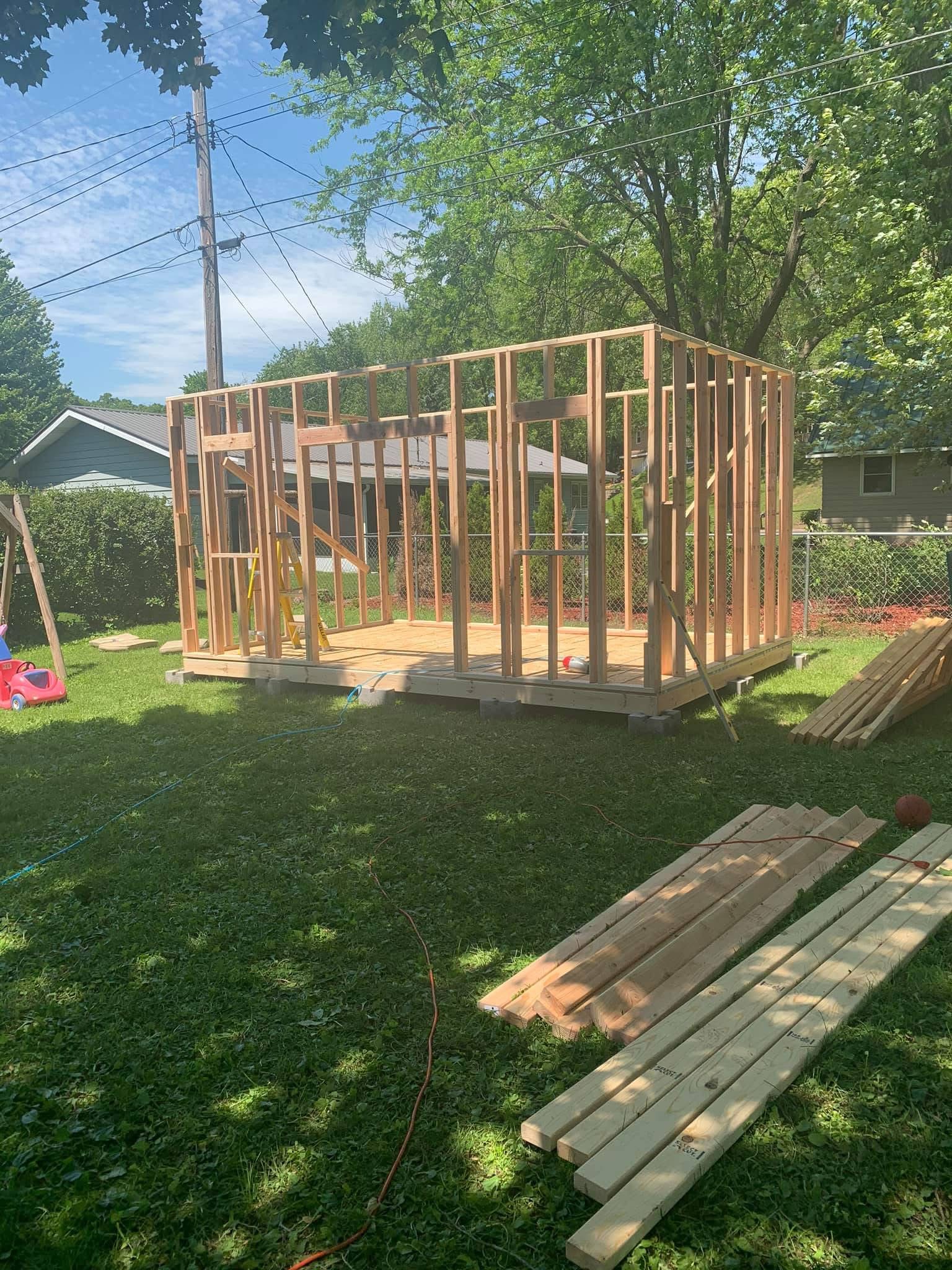 Backyard storage shed framed from the ground up by Rustic Memories