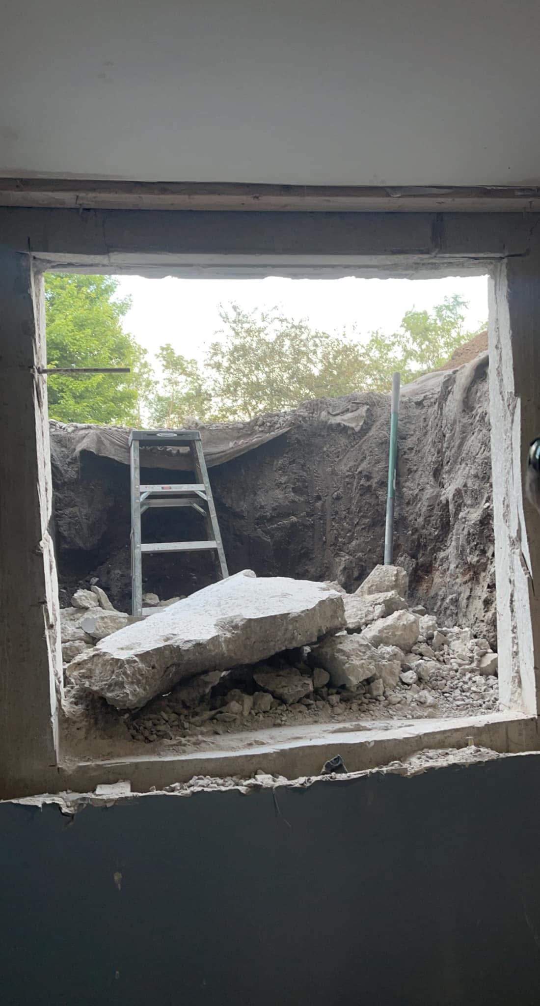 Large wall opening during demolition for a replacement window