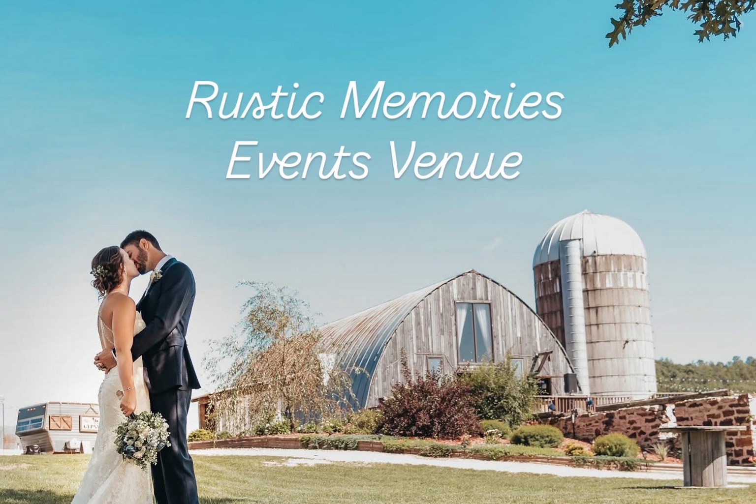 Newlyweds at the real Rustic Memories curved-roof wedding barn and silo
